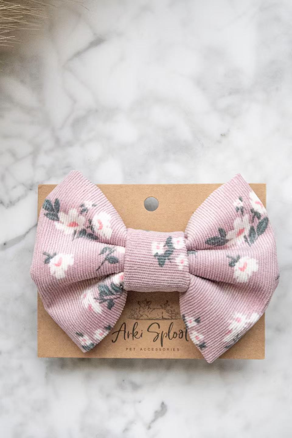 Handmade purple floral corduroy pet bow tie, durable and stylish accessory for dogs.
